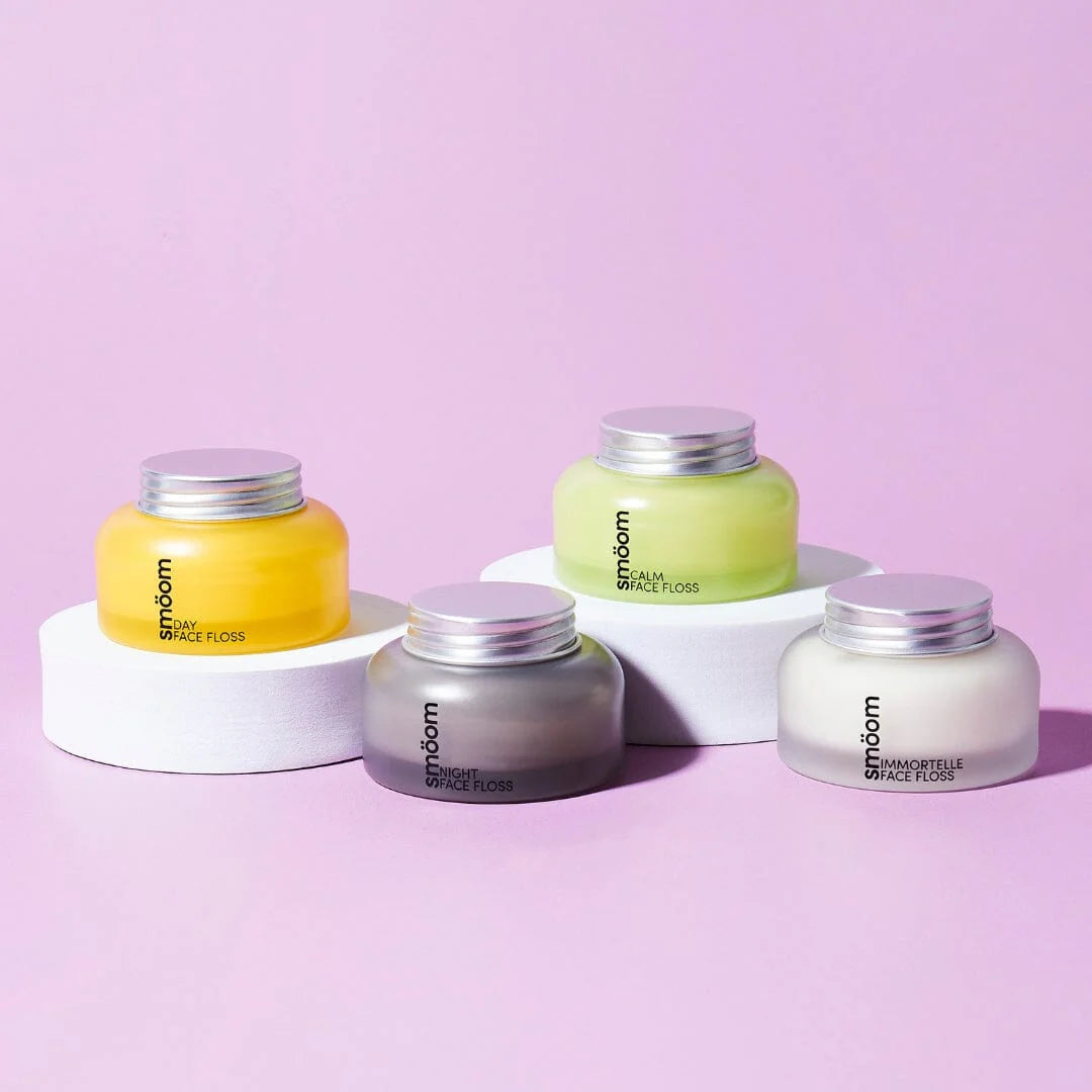 4 Smoom face floss products on pink background