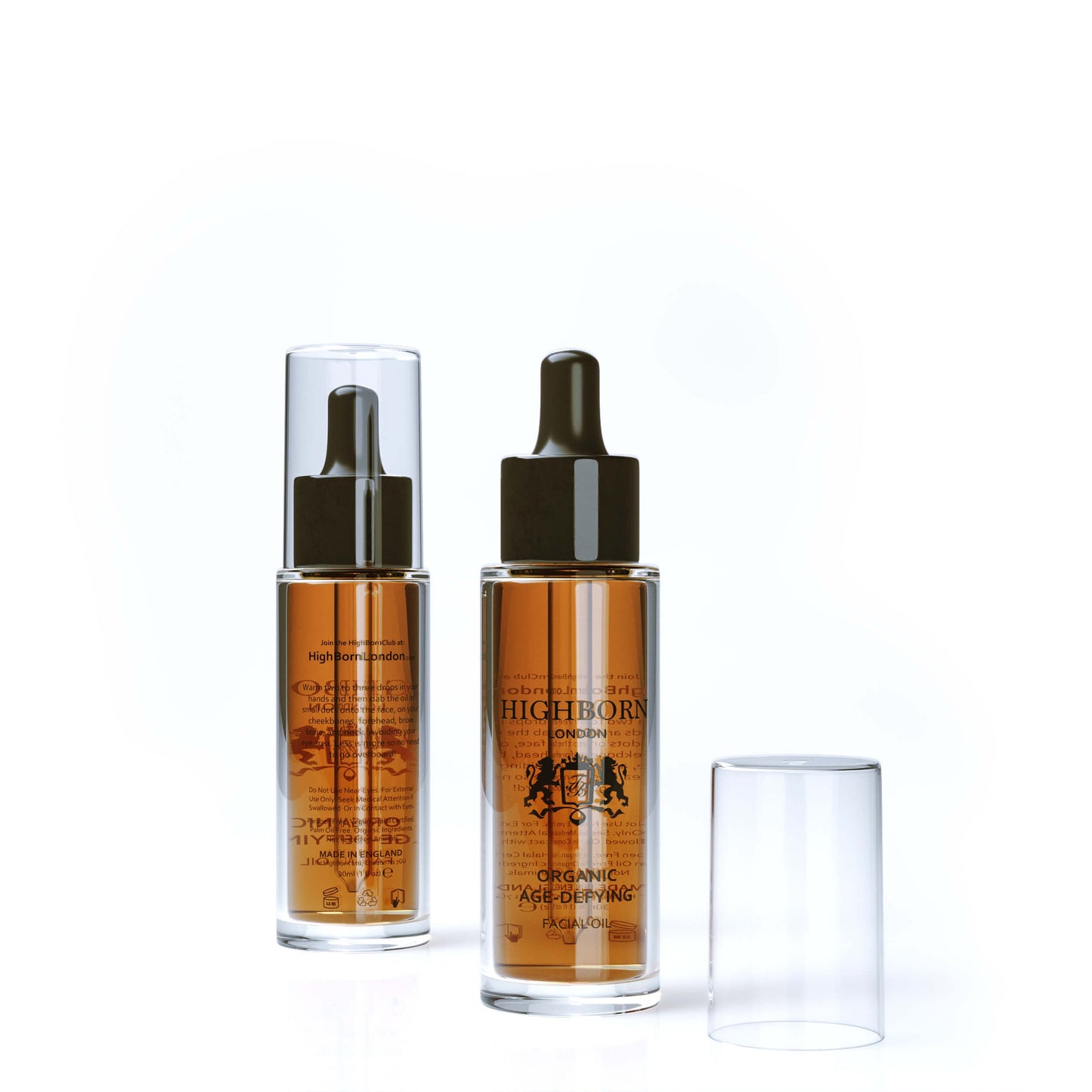 Two skincare bottles with dropper and spray mechanism on a white background