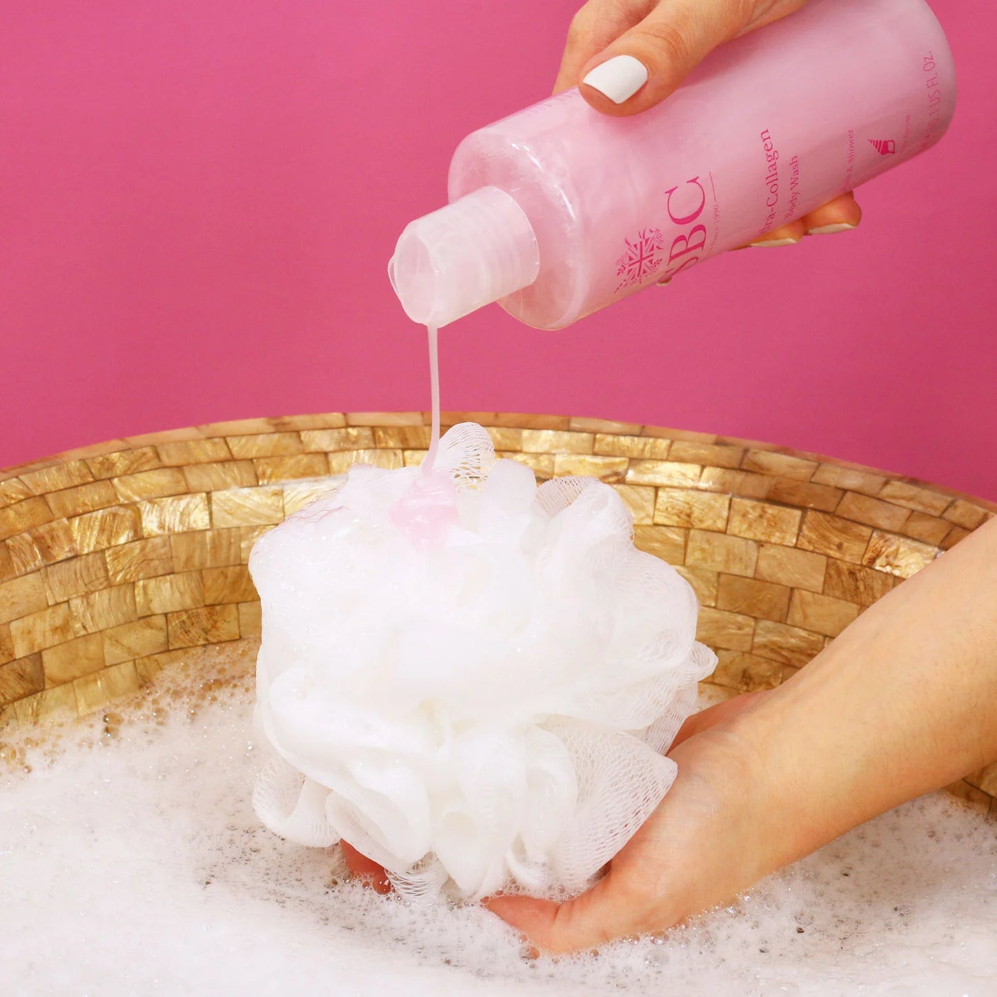 Hydra-Collagen Body Wash 300ml lifestyle using product in sponge