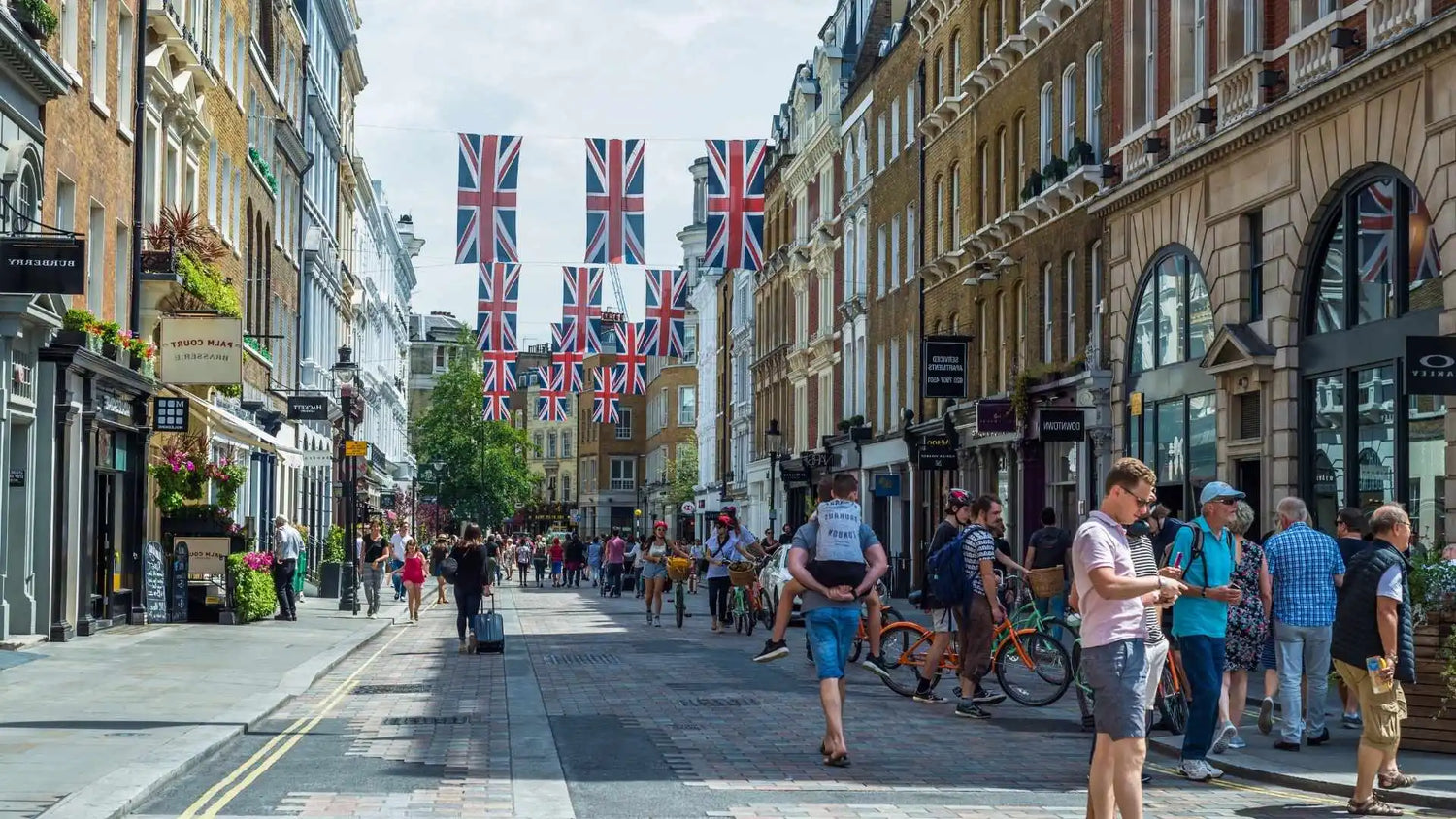 SOHO street in London with Union Jack flags