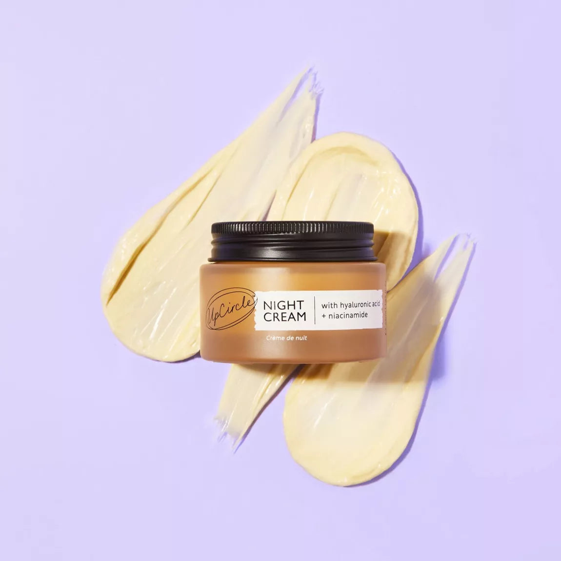 lifestyle image of Upcircle beauty Night Cream with Hyaluronic Acid + Niacinamide with swatch