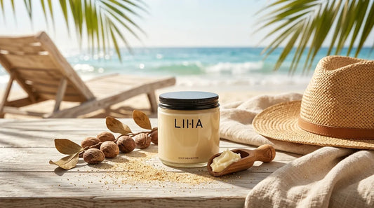 LIHA Beauty Shea Butter Gold lifestyle image on beach with palm leaves and hat