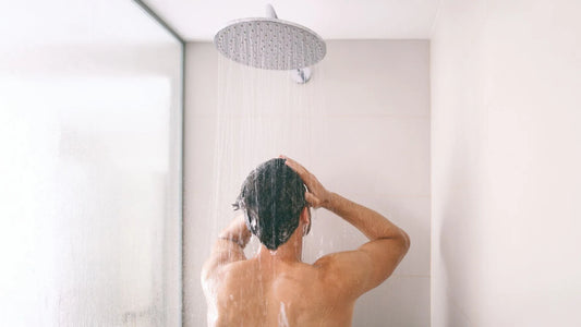 Bath and body for men with man showering
