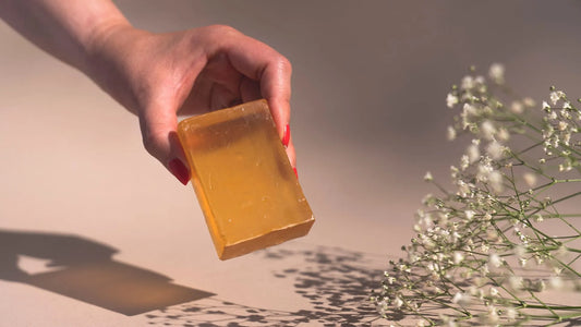 Person holding natural skincare made at home