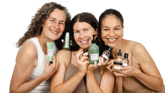 3 women holding UpCircle Beauty products
