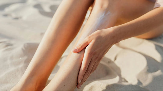 Woman putting on skincare with spf