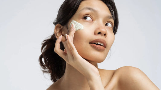 Woman putting on Thunderbird Skin HA+Bakuchiol Renewal Cream