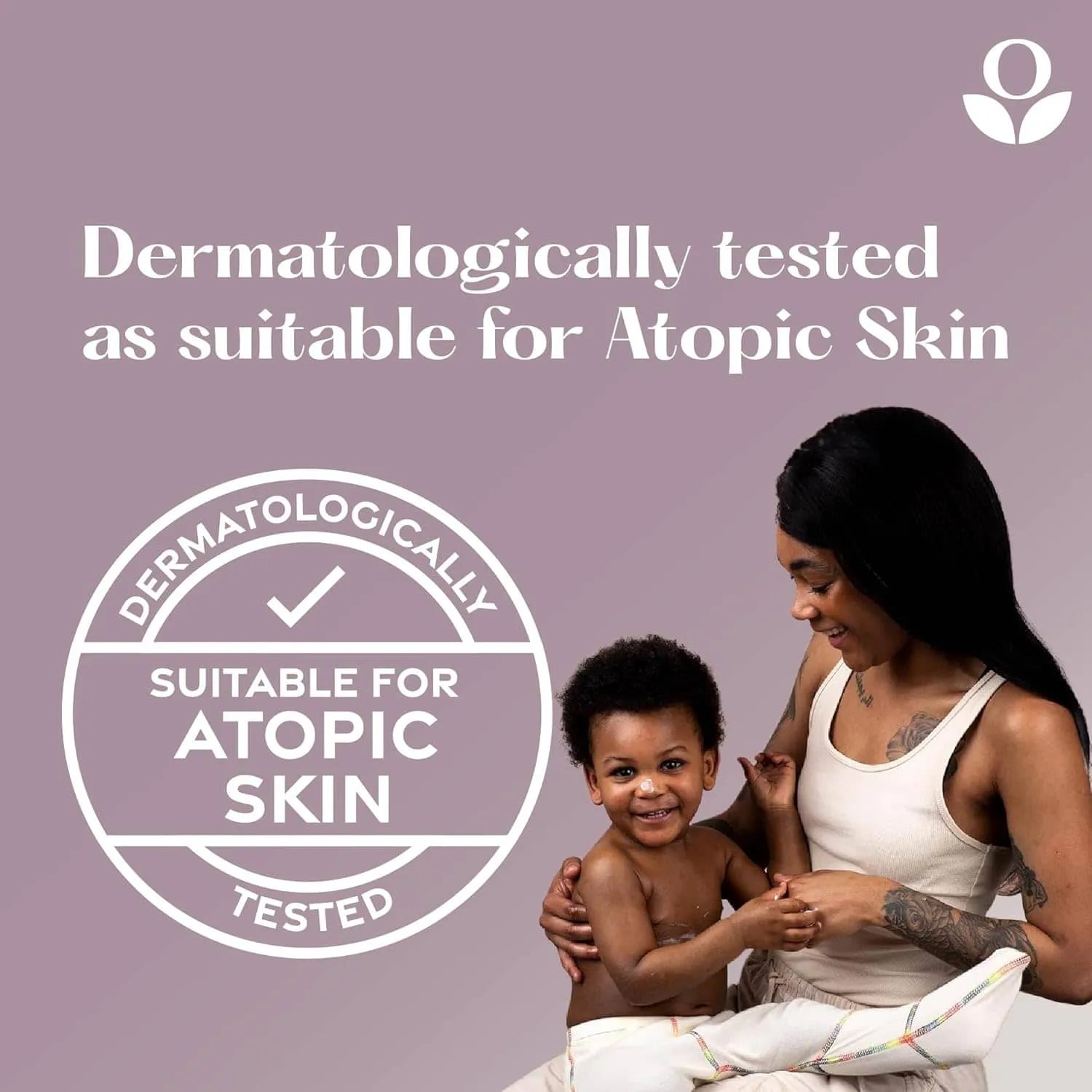 Balmonds Intensive Hand Cream - 50ml model shot of woman holding a child with a dermatologically tested logo on a purple background
