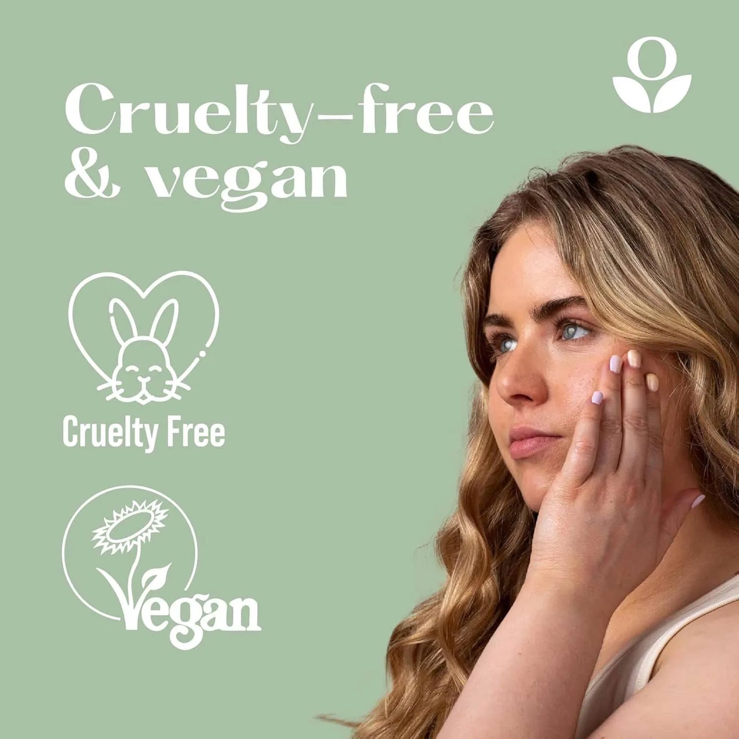 Woman applying Balmonds Omega Rich Cleansing Oil - 125ml to her face with 'Cruelty-free & Vegan' text and icons on a green background