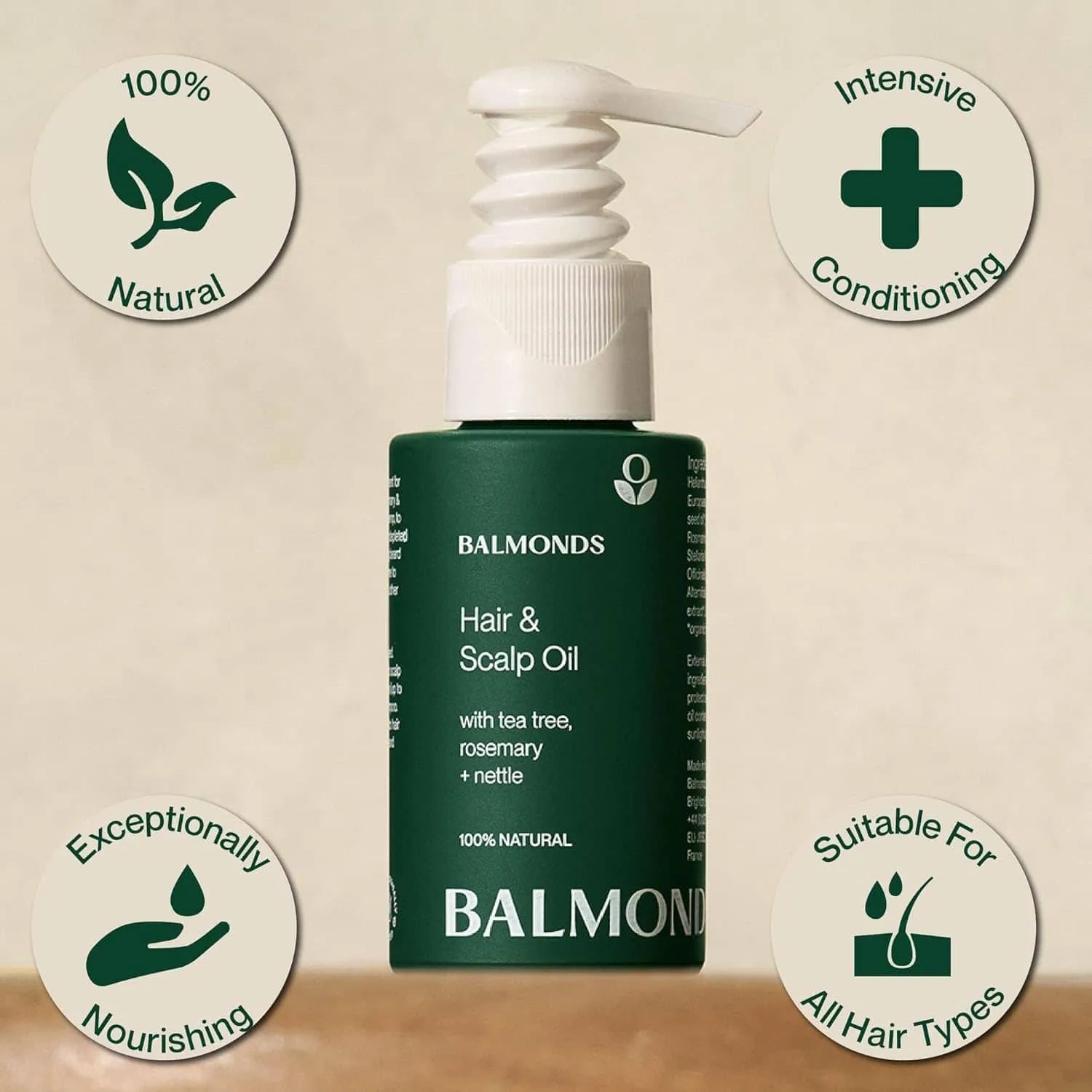 Green bottle of Balmonds Hair and Scalp Oil with pump on a beige background