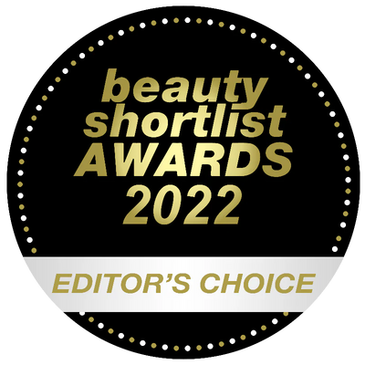 Badge for Beauty Shortlist Awards 2022 Editors' Choice with gold text on a black and white background
