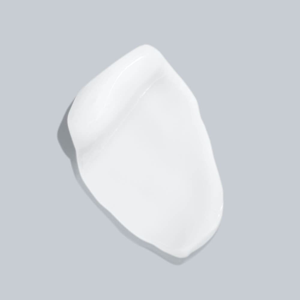 White cream swatch on a light grey background