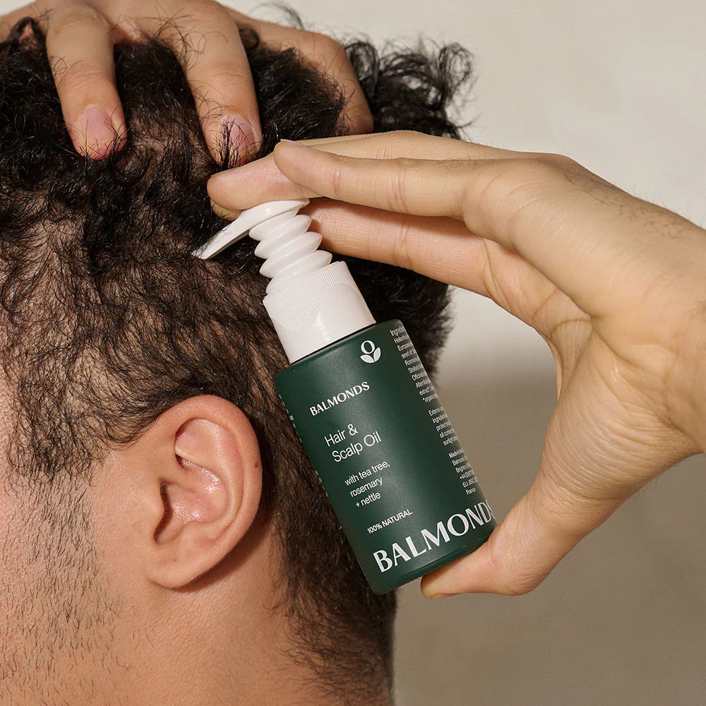 Balmonds Hair & Scalp Oil - 50ml lifestyle shot of person using product on scalp