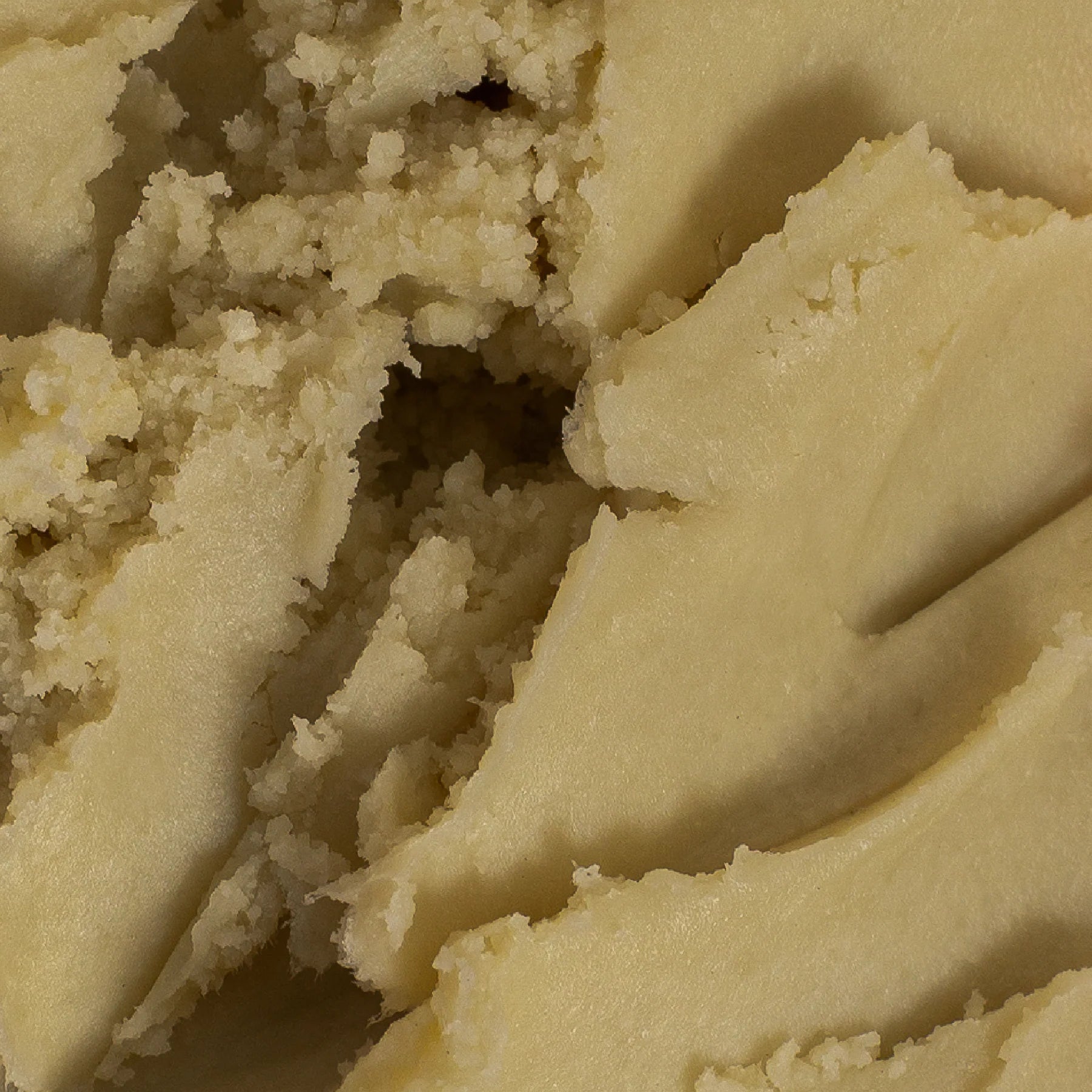 Close-up of creamy beige substance with a soft focus