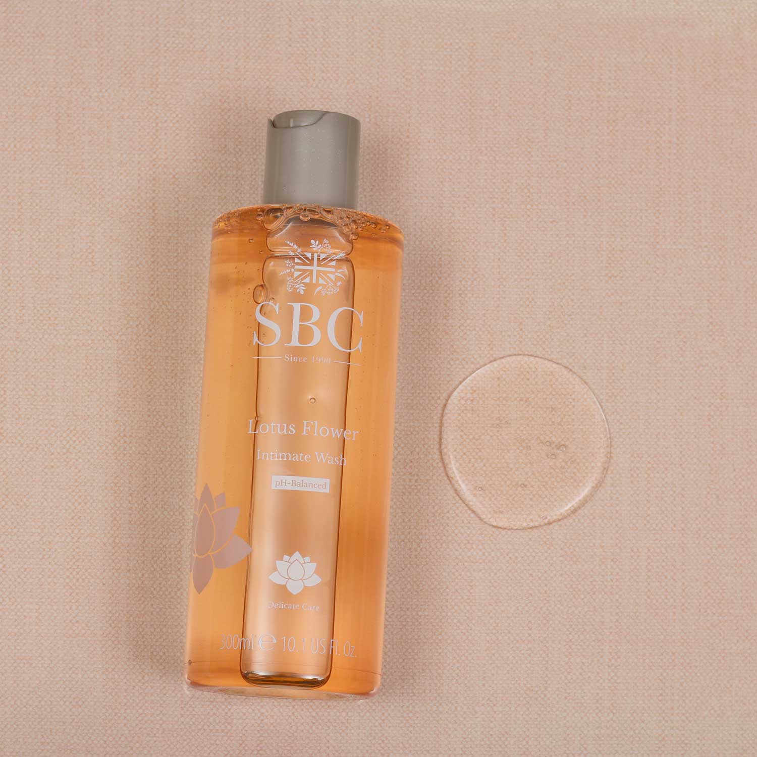 Lotus Flower Intimate Wash 300ml lifestyle shot with swatch