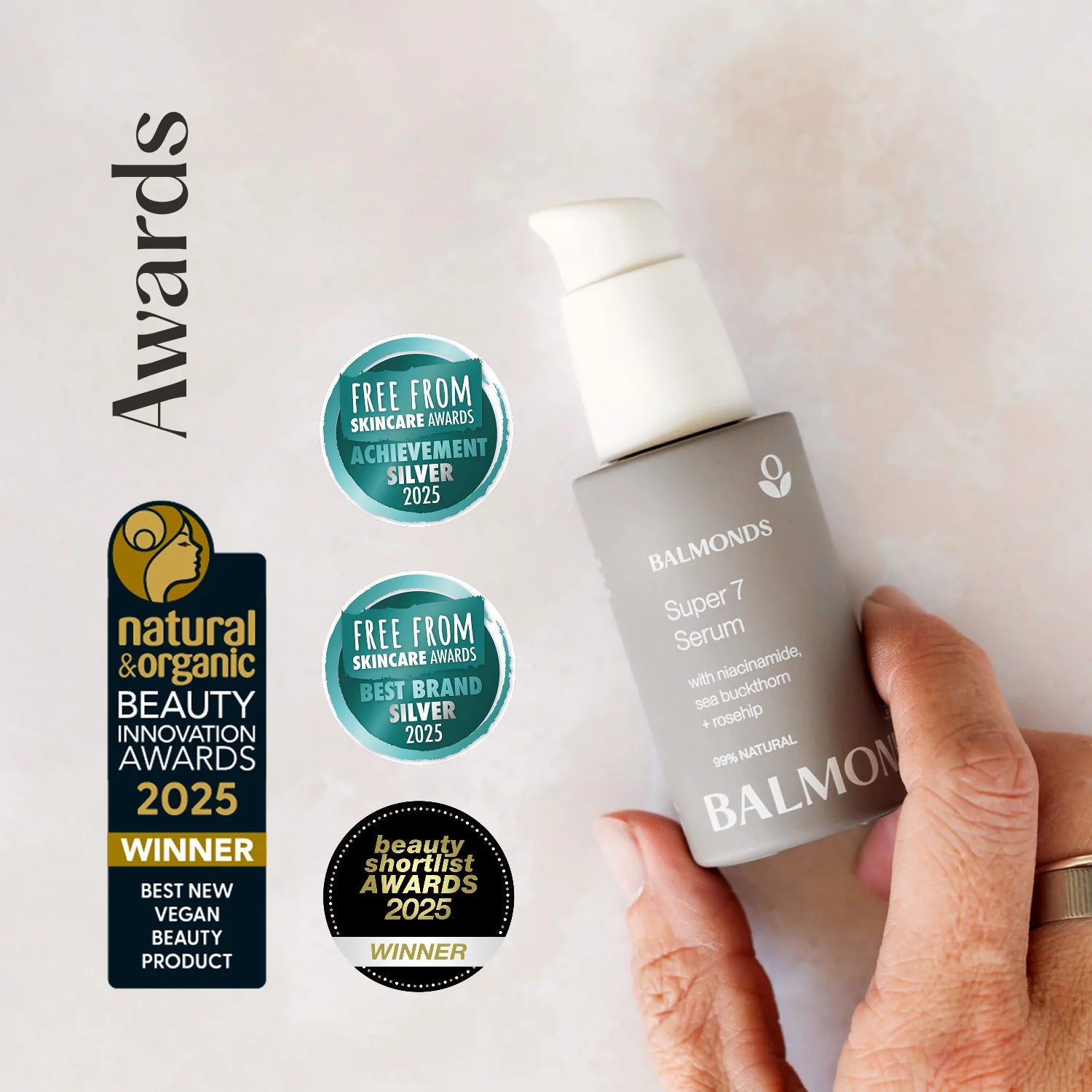 Balmonds Super 7 Serum with awards on a light background
