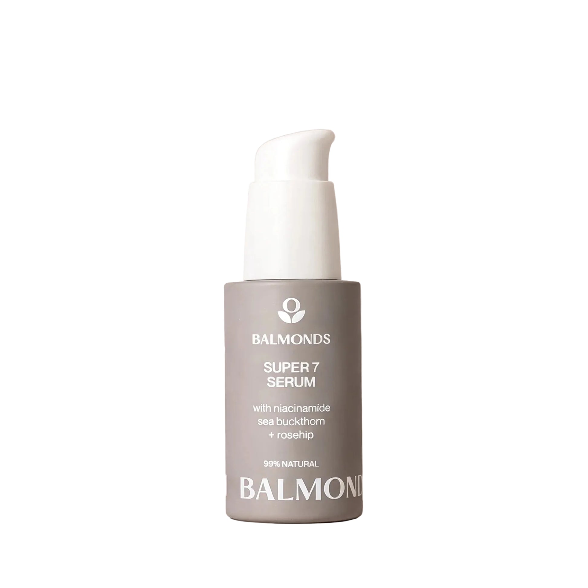Balmonds Super 7 Serum bottle on a beige background