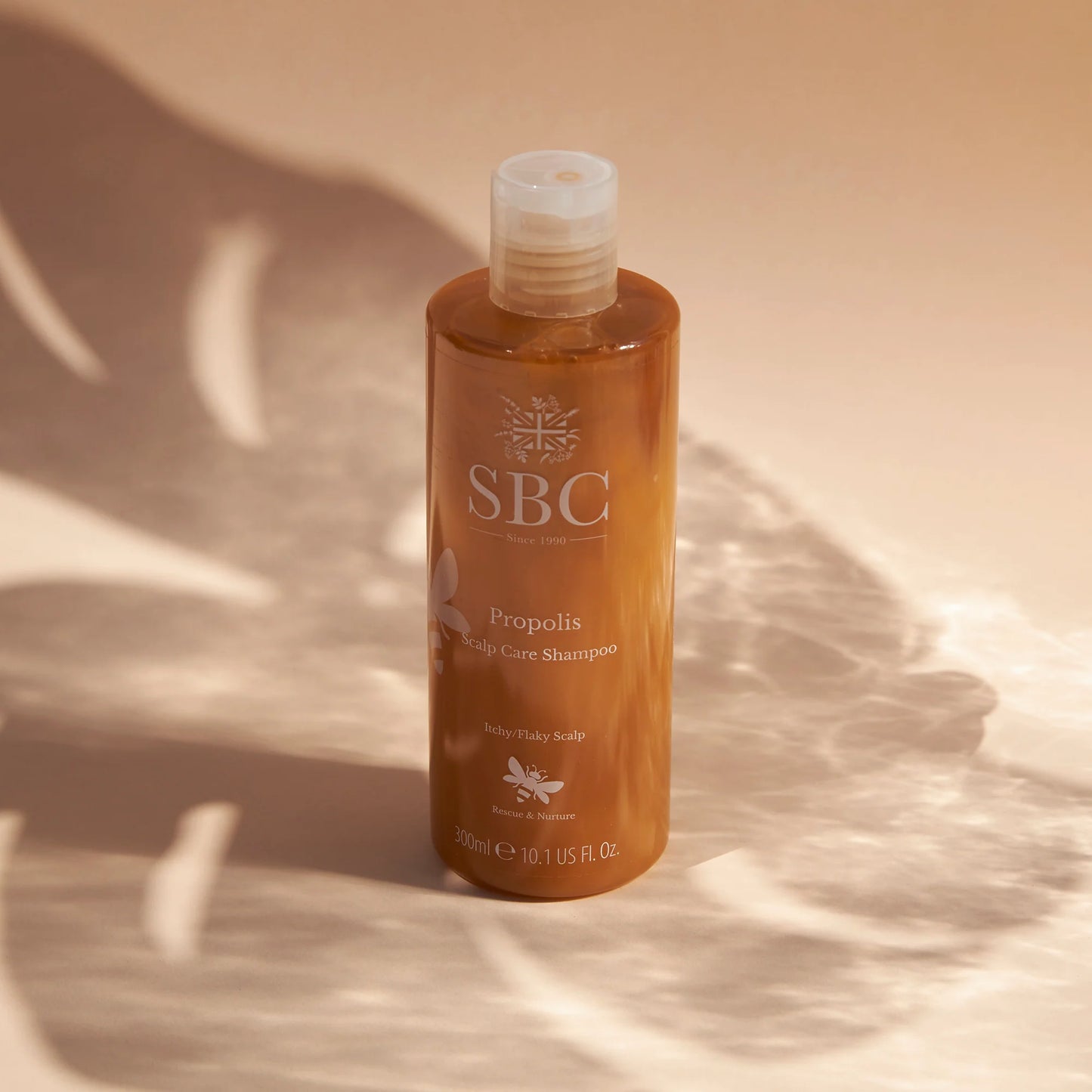 SBC Skincare Propolis Scalp Care Shampoo - 300ml lifestyle shot with shadow