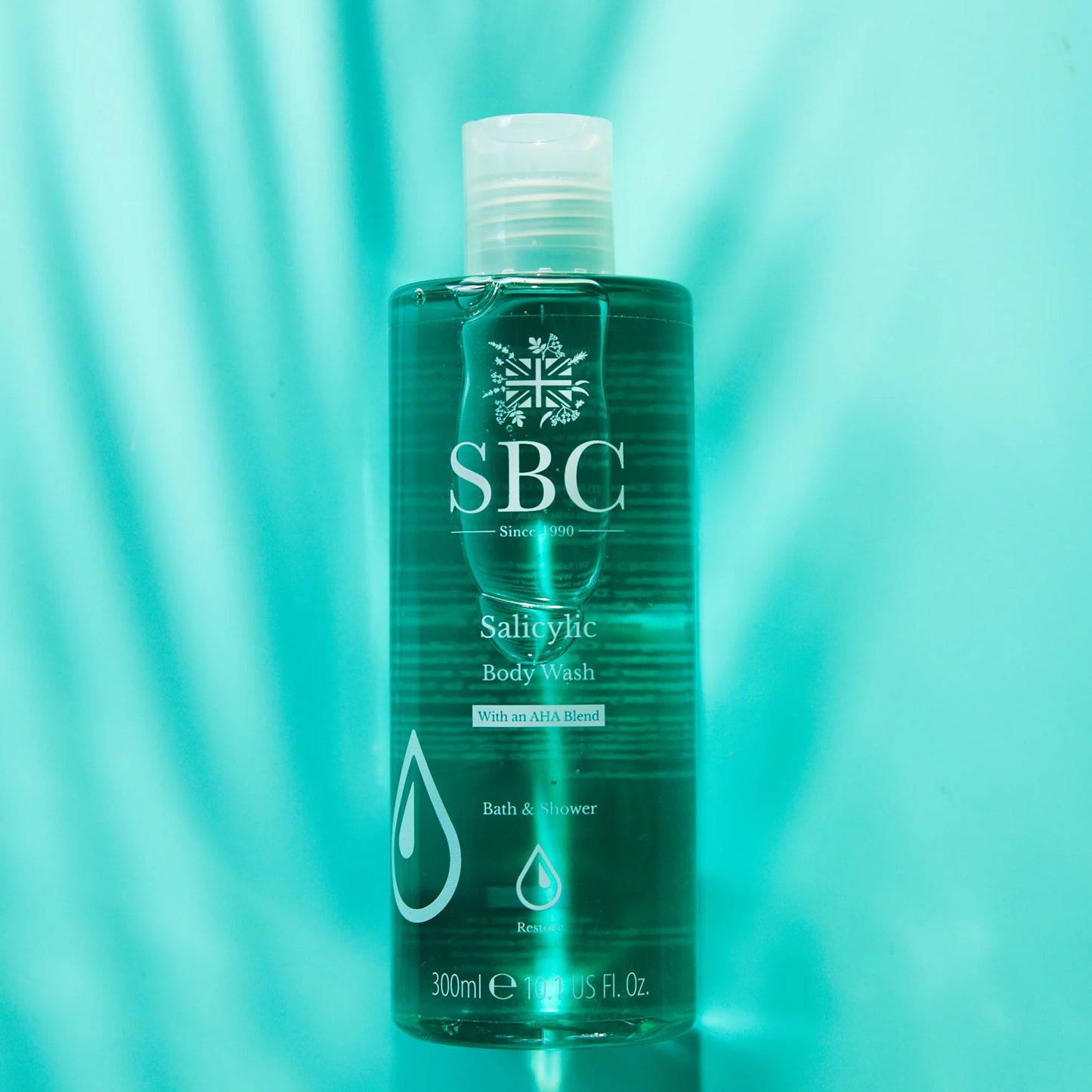 Salicylic Body Wash 300ml lifestyle shot blue background