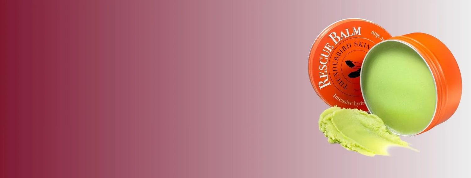 Rescue Balm container with green balm on a pink background