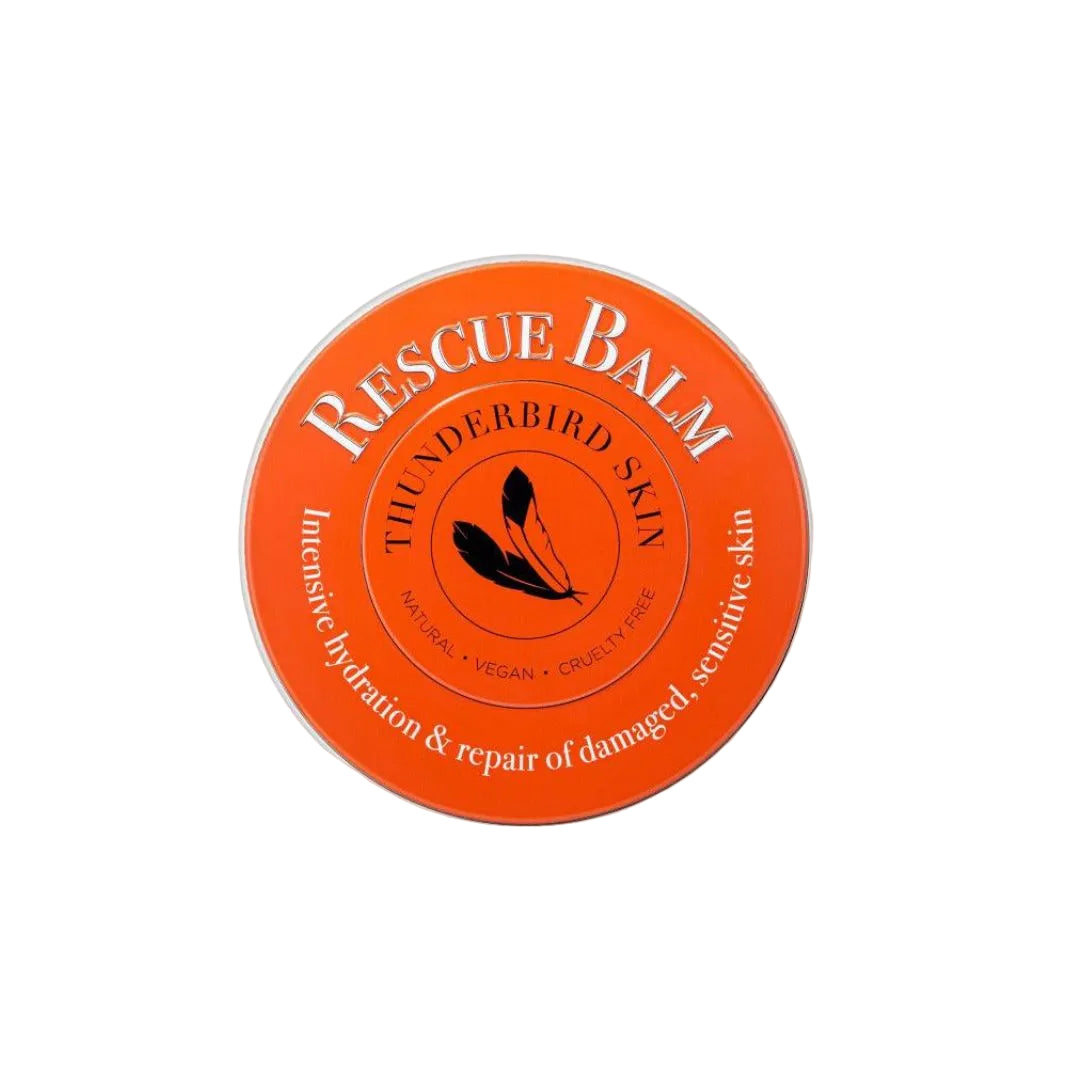 Orange container of Thunderbird Skin Rescue Balm on a white background