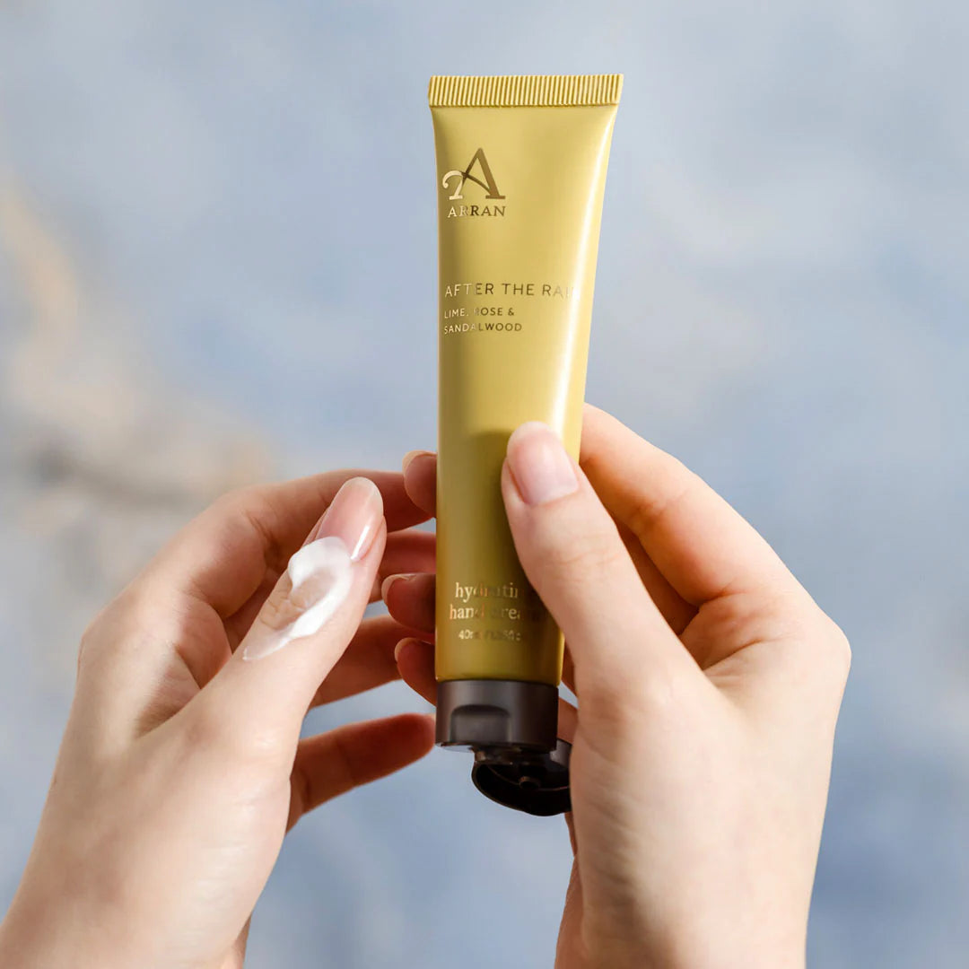 After the Rain Hydrating Hand Cream - 40ml lifestyle shot of person holding product