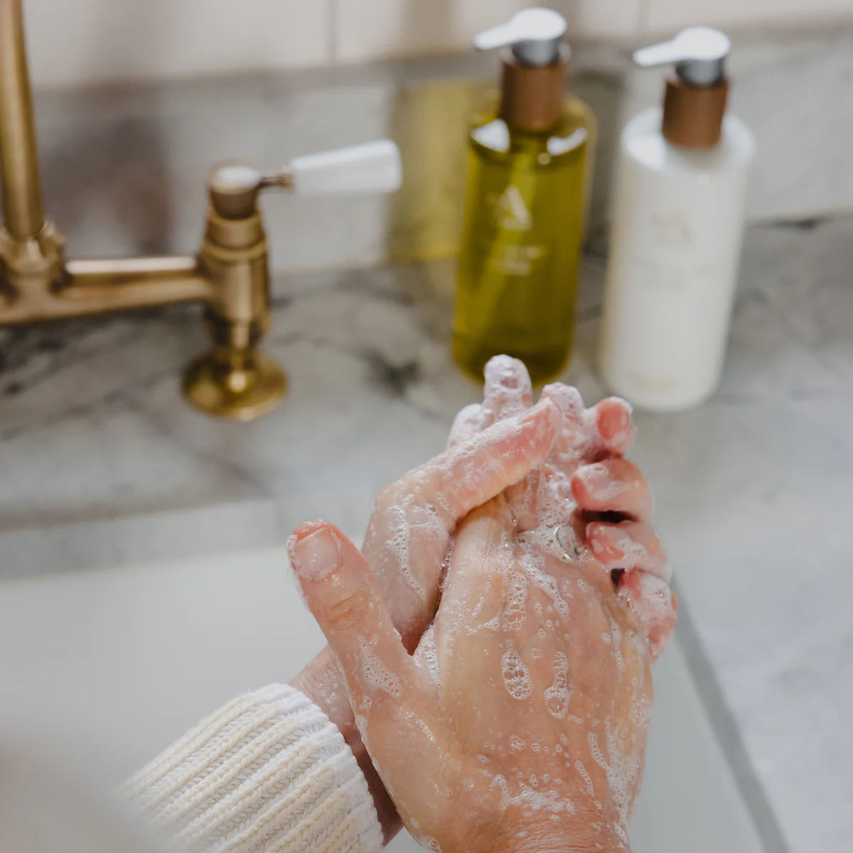 After the Rain Hand Wash - 300ml lifestyle shot of someone with soap on hands
